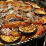 ['Close-up view of a colorful vegetable casserole featuring zucchini, eggplant, bell peppers, and broccoli.', 'Side view of a baked vegetable dish with layers of zucchini, carrots, and melted cheese.', 'Juicy vegetable casserole comprising various vegetables and cheese, presented in a rustic dish.', 'Detailed image of a vibrant mixed vegetable bake topped with cheese and baked until golden.']