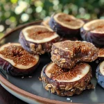 ['Close-up of healthier fig rolls, showcasing their moist texture and rolled shape.', 'Side view of delicious fig rolls made with figs and oats, emphasizing their natural ingredients.', 'Detailed image of wholesome fig rolls, highlighting the fresh ingredients and inviting appearance.', 'Juicy and healthy fig rolls displayed with a focus on their soft texture and rich color.']