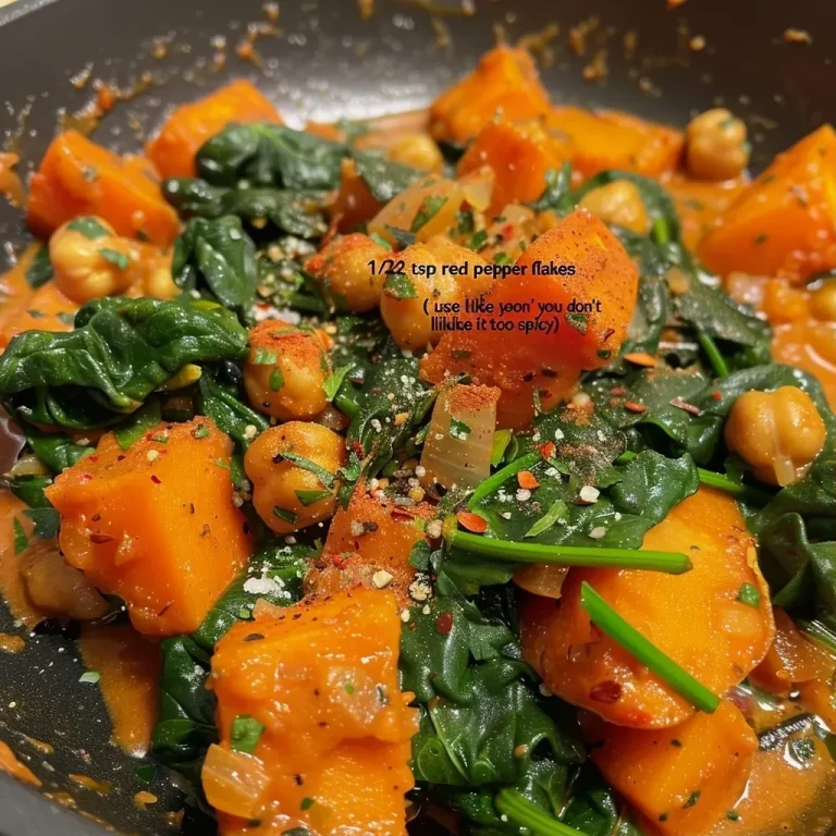 ['Close-up view of a bowl of vibrant sweet potato curry with fresh spinach and chickpeas.', 'Side view of a delicious sweet potato curry, showcasing chunks of sweet potatoes and herbs.', 'Juicy sweet potato curry with a creamy texture, accented by spices and green spinach.', 'Colorful plate of sweet potato curry, featuring garnished herbs and a rich sauce.']