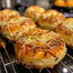 ['Close-up side view of a serving of Wirsing Auflauf with goat cheese and pecans.', 'Juicy baked Wirsing Auflauf featuring goat cheese and crunchy pecans, photographed from the side.', 'Side shot of Wirsing casserole topped with goat cheese and pecan pieces, showing its creamy texture.', 'A detailed view of Wirsing Auflauf with a golden crust of goat cheese and sprinkled pecans.']